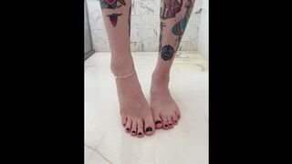 sexy trans girl pissing on her own feet and teasing