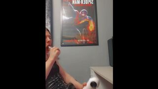 Femboy sucks dildo while using her flashlight