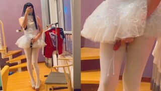 A ballet dancer wearing white pantyhose was made to ejaculate by a sex toy